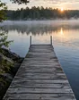 Dock into a misty lake at sunrise. Generated sample photograph.